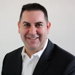 Stephen Mitroff smiles in a headshot.