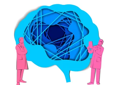 A drawing shows two scientists colored pink analyzing a brain colored blue.