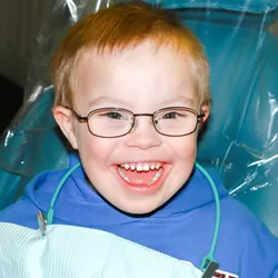 A young child with Down syndrome at the dentist.