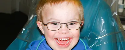 A young child with Down syndrome at the dentist.