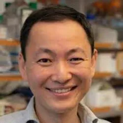 Li Li, PhD smiles in a lab.
