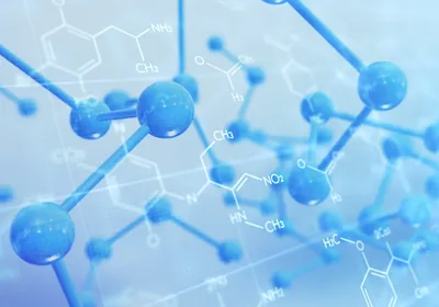 An illustration of a three-dimensional molecular model with chemical formulas overlaid.