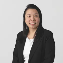 Image of Xiaowei Wang. She wears a black jacket over a white top.