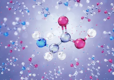 3D illustration of  amino acids, with glycine prominently in the middle of the image and more out of focus molecules in the background. The two backbone carbon atoms are gray, the oxygen atoms are red, the nitrogen is blue, and the hydrogen atoms are white. 
