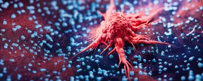 One red cancer cell stands out among uniform blue cells on a tissue surface.