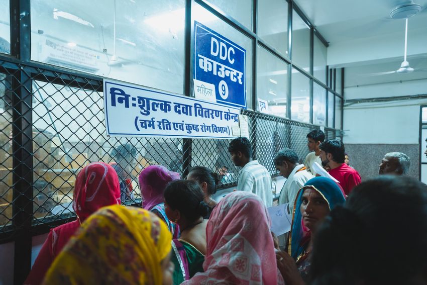 Patients gather around the entrance to a mycetoma clinic.
