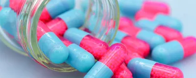 Colorful of oral medications capsule, signifying macrocyclic peptide therapeutics.
