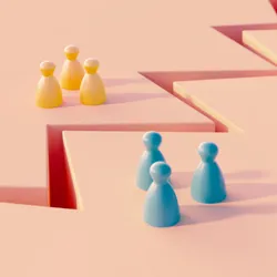 A crevasse between two groups of blue and yellow colored pawns on a pink background.