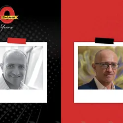 In the TS 40th Anniversary template, Sarkis Mazmanian smiles in a black and white headshot photo on the left. In a photo on the right, he stands in front of a large image of a cross-section of the brain. He wears a navy jacket, a white shirt, and glasses.